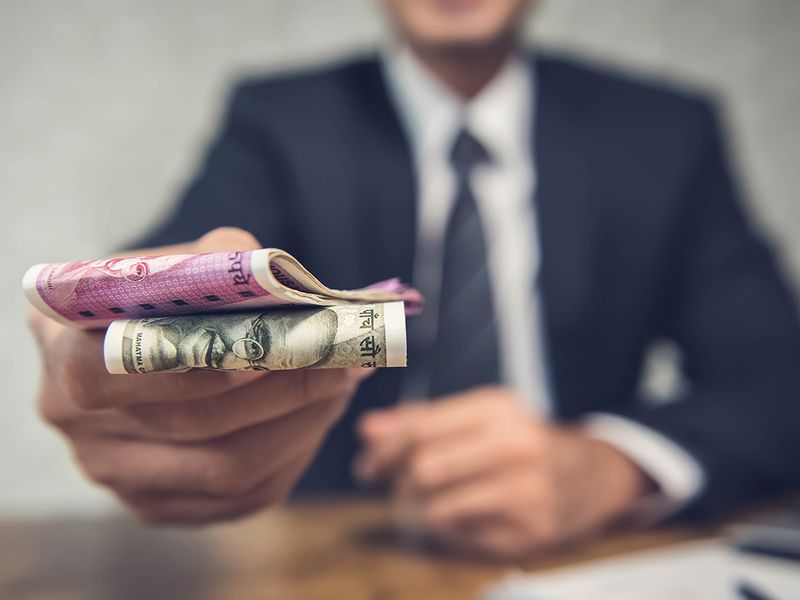 NRIs Working From India: What All Taxes Should You Keep In Mind?