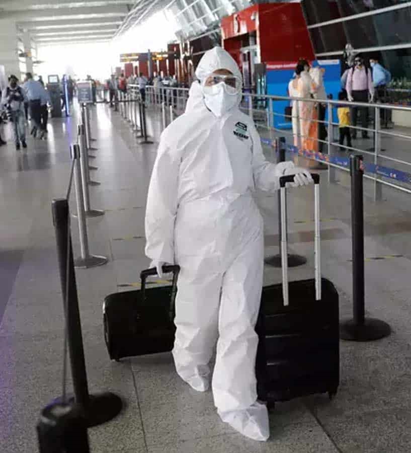 Passengers in PPe Suits